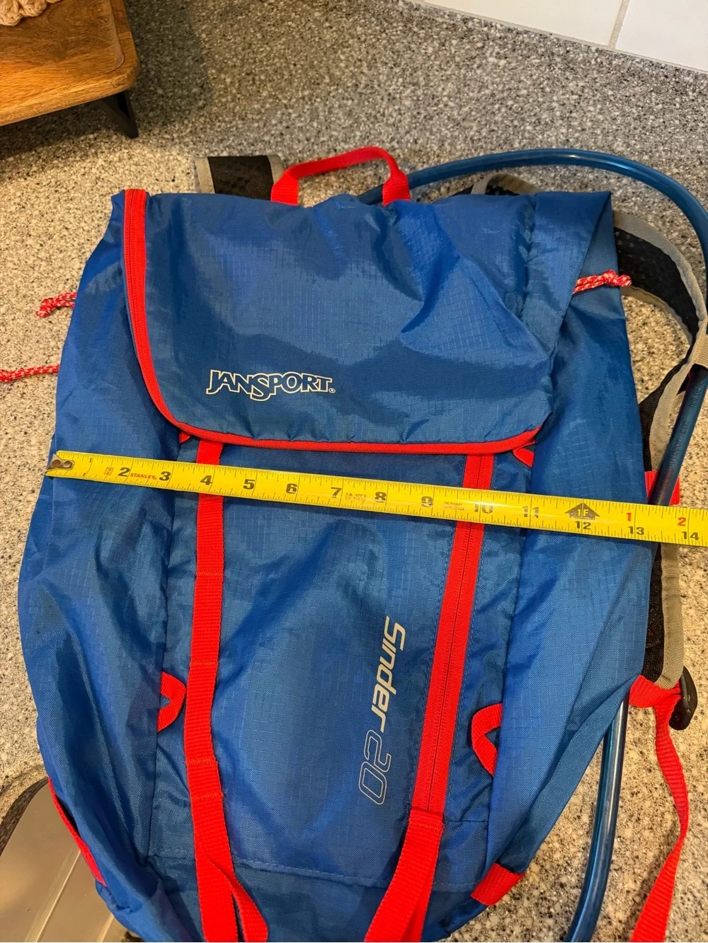 Jansport Blue Backpack with Red Accents and Hydration Bladder